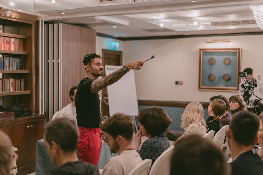 Sachin Sharma coaching a room